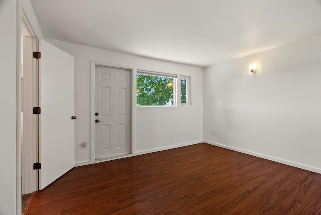 4626 E Orchard Rd, Spokane, WA 99217 - empty room with dark wood-style flooring and baseboards