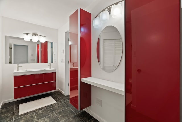 4626 E Orchard Rd, Spokane, WA 99217 - bathroom featuring double vanity, baseboards, and tile patterned floors