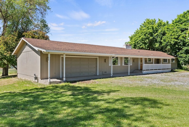 4626 E Orchard Rd, Spokane, WA 99217 - single story home with an attached garage, a front lawn, a chimney, and covered porch