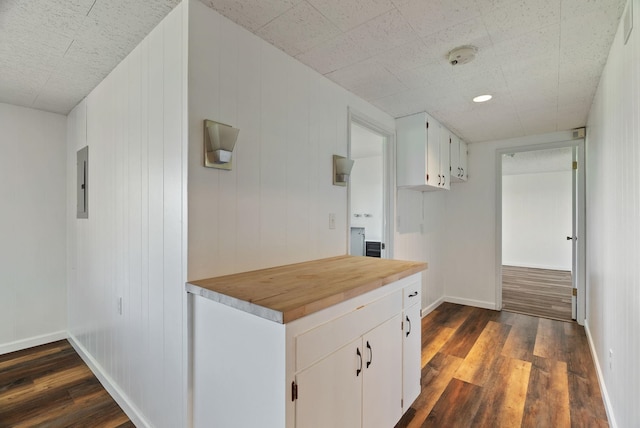 4626 E Orchard Rd, Spokane, WA 99217 - hallway featuring dark wood-type flooring, baseboards, and electric panel