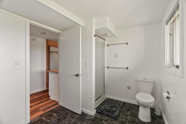 4626 E Orchard Rd, Spokane, WA 99217 - full bath featuring toilet, a stall shower, and baseboards