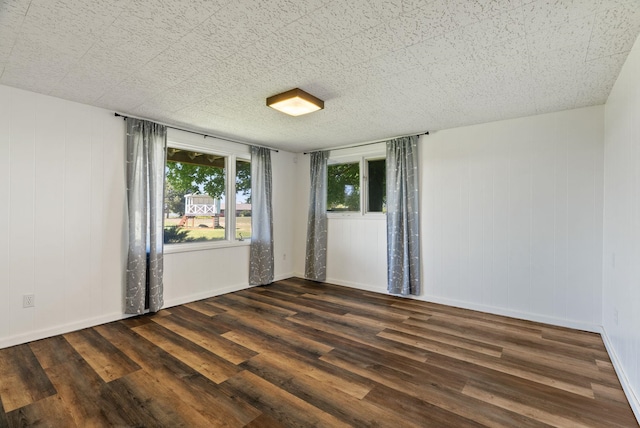 4626 E Orchard Rd, Spokane, WA 99217 - spare room with dark wood-style flooring