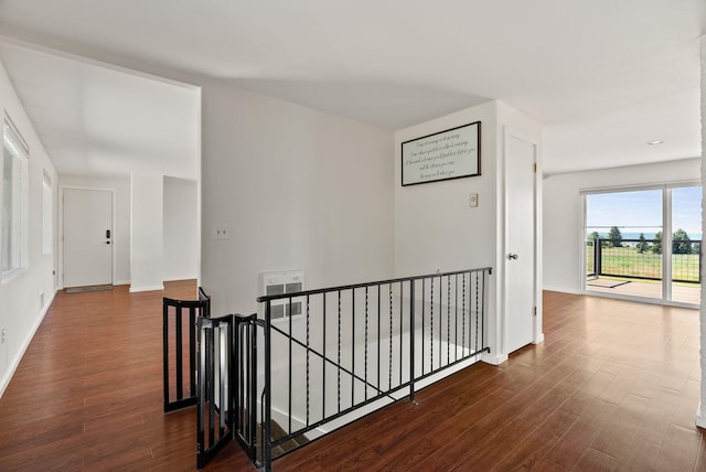 4626 E Orchard Rd, Spokane, WA 99217 - hall featuring an upstairs landing, wood finished floors, and baseboards