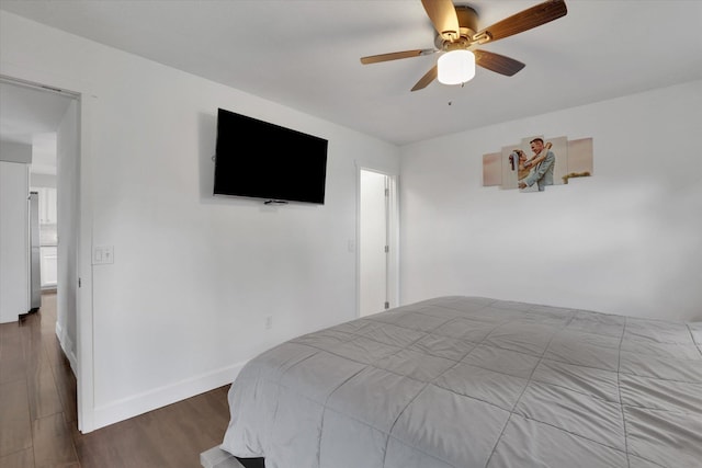 4606 S Grove Rd, Spokane, WA 99224 - bedroom with wood finished floors, baseboards, and ceiling fan