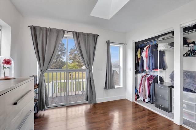 4606 S Grove Rd, Spokane, WA 99224 - bedroom with access to outside, a skylight, wood finished floors, and baseboards
