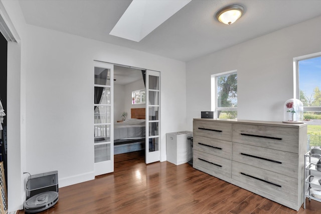 4606 S Grove Rd, Spokane, WA 99224 - spacious closet featuring dark wood-type flooring, a skylight, and french doors