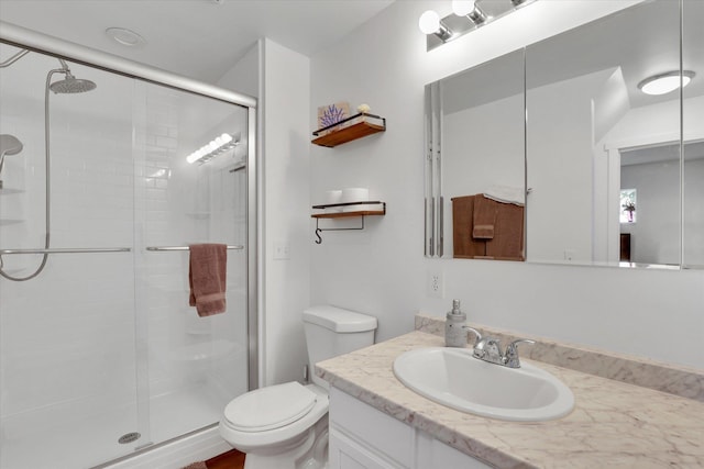 4606 S Grove Rd, Spokane, WA 99224 - bathroom with a stall shower, vanity, and toilet