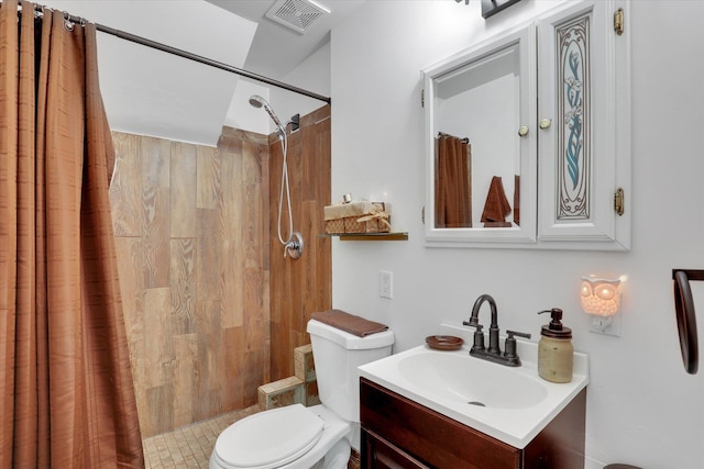 4606 S Grove Rd, Spokane, WA 99224 - full bath featuring toilet, vanity, and a tile shower