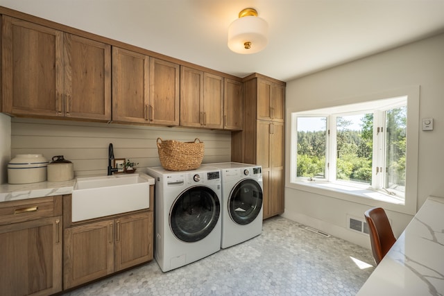 19009 N Little Spokane Dr, Colbert, WA 99005 - washroom with cabinet space, washing machine and clothes dryer, and light flooring