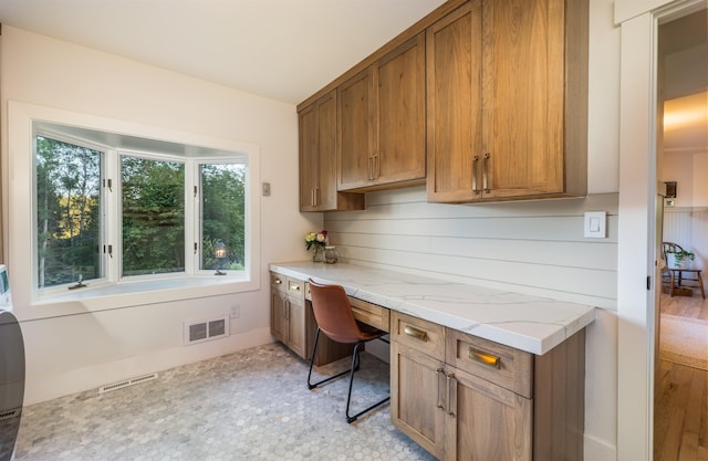19009 N Little Spokane Dr, Colbert, WA 99005 - office space featuring built in desk, baseboards, and light floors