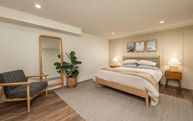 19009 N Little Spokane Dr, Colbert, WA 99005 - bedroom featuring wood finished floors, recessed lighting, a baseboard radiator, and baseboards