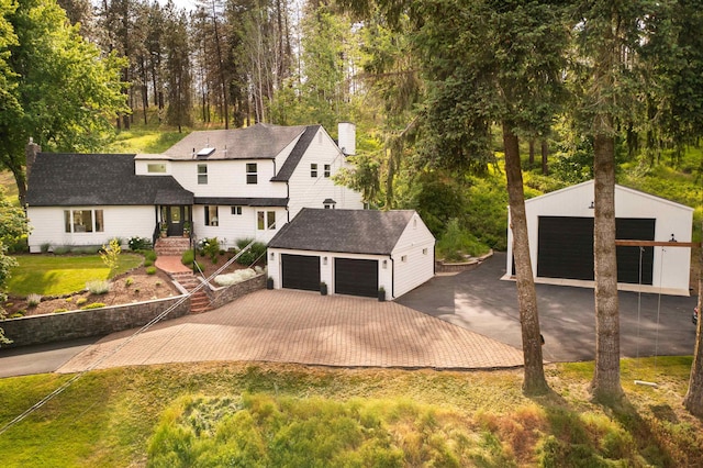 19009 N Little Spokane Dr, Colbert, WA 99005 - view of front of property featuring an outbuilding, a chimney, driveway, and a front lawn