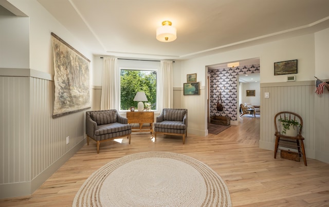 19009 N Little Spokane Dr, Colbert, WA 99005 - living area featuring wainscoting and light wood-type flooring