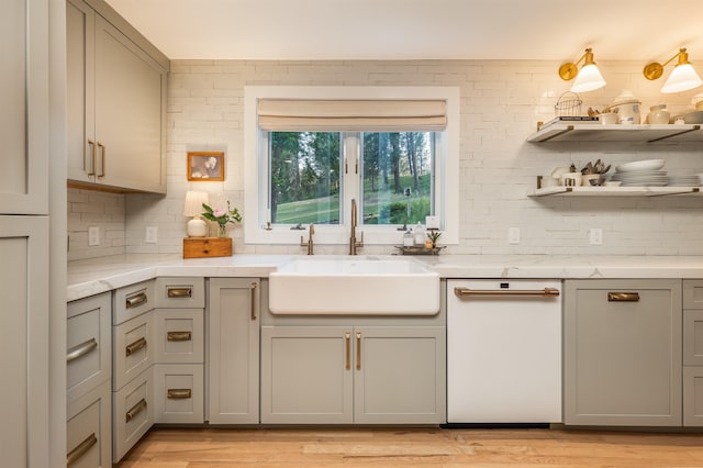 19009 N Little Spokane Dr, Colbert, WA 99005 - kitchen featuring a sink, white dishwasher, gray cabinetry, and tasteful backsplash