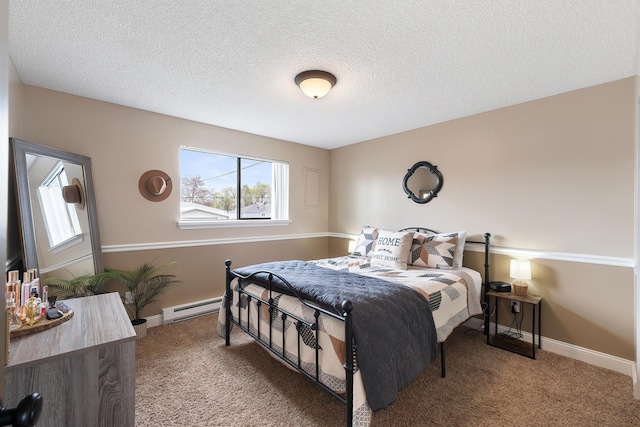 1641 E Crown Ave, Spokane, WA 99207 - bedroom featuring a baseboard heating unit, carpet floors, a textured ceiling, and baseboards