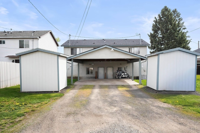 1641 E Crown Ave, Spokane, WA 99207 - view of front of home featuring dirt driveway and a carport
