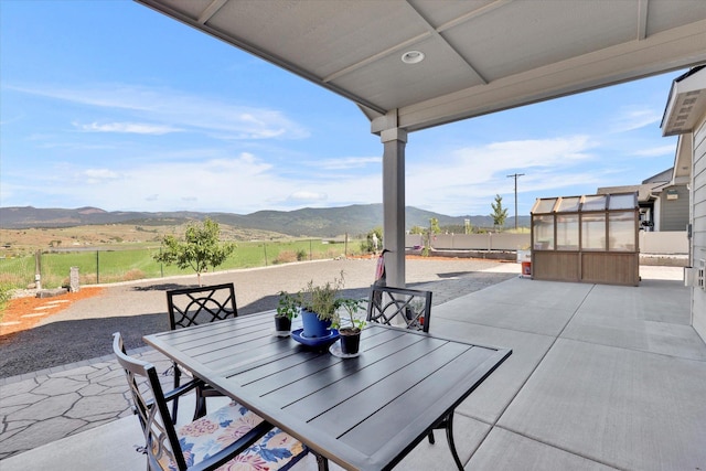 1725 S Donwood St, Spokane Valley, WA 99037 - view of patio / terrace with a mountain view and outdoor dining area