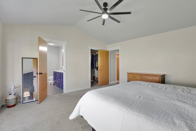10102 N Comanche Dr, Spokane, WA 99208 - bedroom with vaulted ceiling, a spacious closet, carpet floors, a closet, and ensuite bath