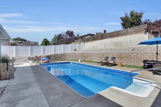 10102 N Comanche Dr, Spokane, WA 99208 - view of swimming pool featuring a fenced backyard and a patio area