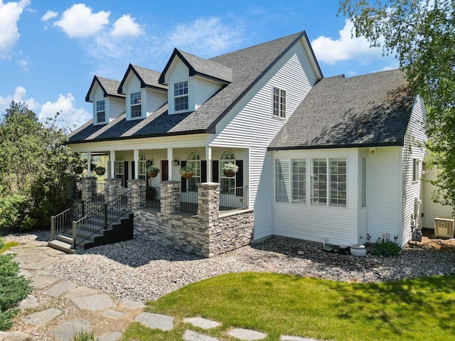 5711 E Nancy Ln, Mead, WA 99021 - cape cod home with central AC, covered porch, and a shingled roof