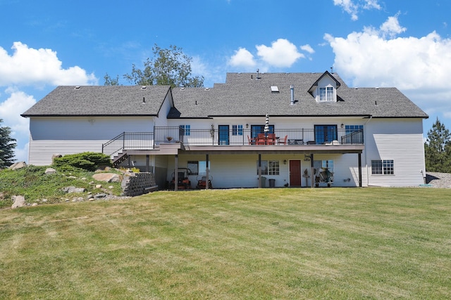 5711 E Nancy Ln, Mead, WA 99021 - rear view of house featuring a deck, a lawn, stairway, and roof with shingles