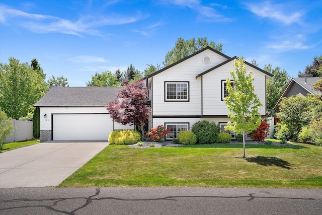 1725 N Mcmillan Ln, Spokane Valley, WA 99016 - view of front facade with a garage and driveway