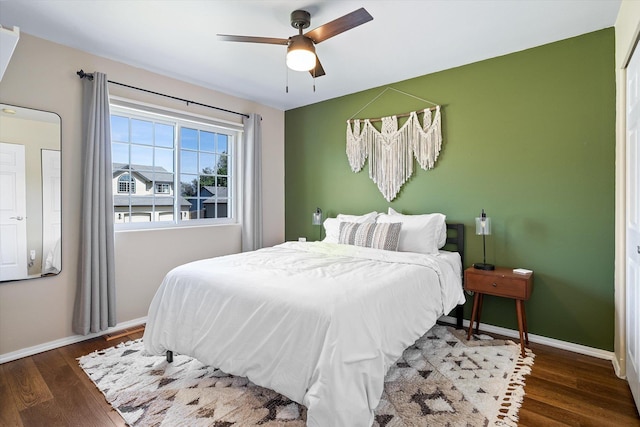 1725 N Mcmillan Ln, Spokane Valley, WA 99016 - bedroom with wood finished floors, baseboards, and a ceiling fan