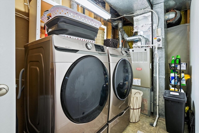 1725 N Mcmillan Ln, Spokane Valley, WA 99016 - laundry room featuring independent washer and dryer and tile patterned flooring
