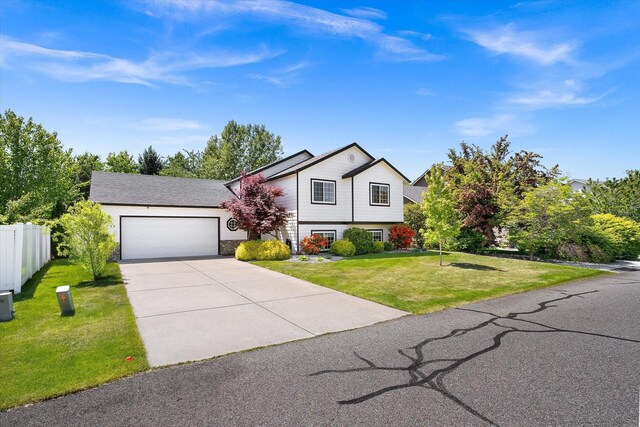 1725 N Mcmillan Ln, Spokane Valley, WA 99016 - view of front of home featuring an attached garage and driveway