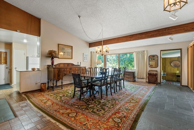 2616 S SE Blvd Unit 2606, Spokane, WA 99223 - dining space featuring a chandelier and a textured ceiling