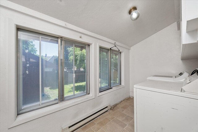 617 W Carlisle Ave, Spokane, WA 99205 - laundry room with a baseboard heating unit, washer and dryer, healthy amount of natural light, and a textured ceiling