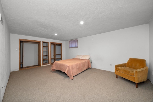 617 W Carlisle Ave, Spokane, WA 99205 - carpeted bedroom with a textured ceiling and recessed lighting