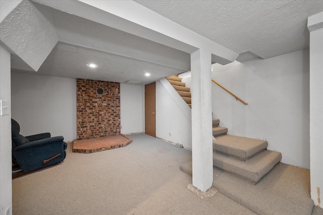 617 W Carlisle Ave, Spokane, WA 99205 - finished basement with carpet flooring, stairs, recessed lighting, and a textured ceiling