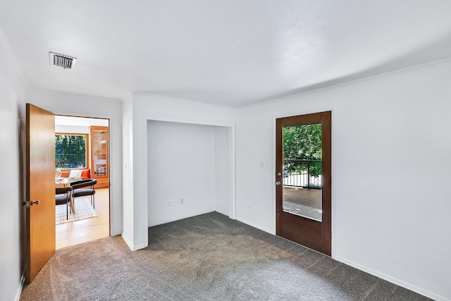 10401 N College Cir, Spokane, WA 99218 - empty room featuring carpet floors and ornamental molding