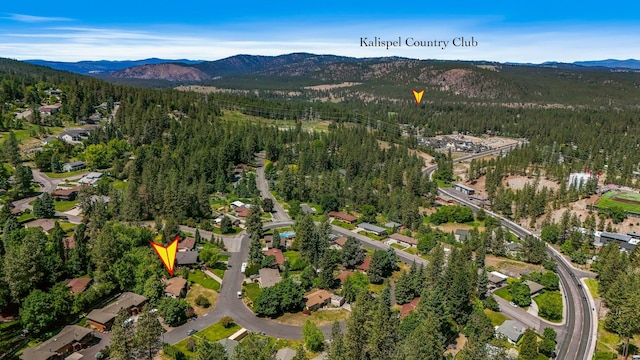 10401 N College Cir, Spokane, WA 99218 - view of property location featuring a forest and a mountain backdrop