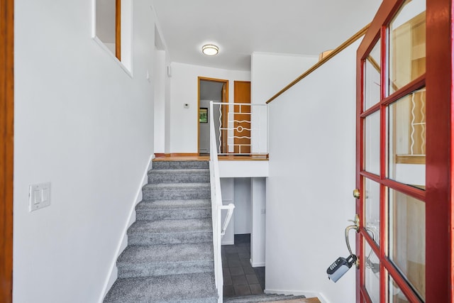 10401 N College Cir, Spokane, WA 99218 - stairway with baseboards and tile patterned floors