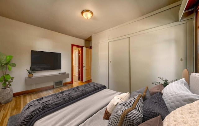 18 N 7th St, Cheney, WA 99004 - bedroom with wood finished floors and baseboards