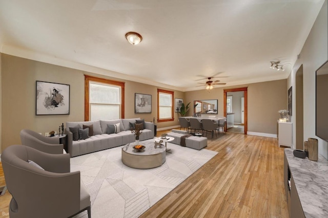 18 N 7th St, Cheney, WA 99004 - living area featuring a ceiling fan, light wood-type flooring, and baseboards