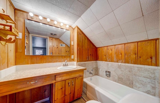 18 N 7th St, Cheney, WA 99004 - full bath with a garden tub, vanity, lofted ceiling, and wooden walls