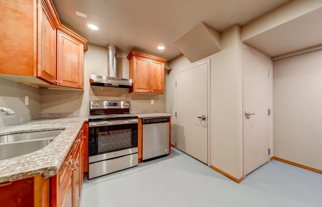 18 N 7th St, Cheney, WA 99004 - kitchen featuring stainless steel appliances, a sink, recessed lighting, concrete flooring, and under cabinet range hood