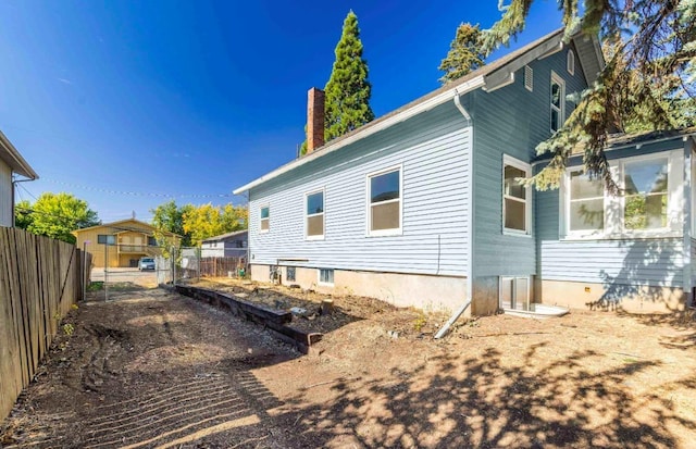 18 N 7th St, Cheney, WA 99004 - view of side of home featuring a chimney