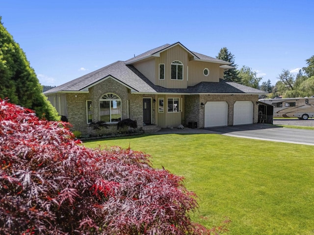 12621 N E Newman Lake Dr, Newman Lake, WA 99025 - traditional-style house with asphalt driveway, a shingled roof, a front lawn, and an attached garage