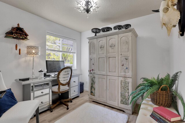 8310 E Bull Pine Ln, Spokane, WA 99217 - office area with light wood-style floors