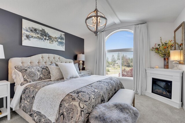 8310 E Bull Pine Ln, Spokane, WA 99217 - carpeted bedroom with a chandelier and a glass covered fireplace