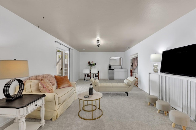 8310 E Bull Pine Ln, Spokane, WA 99217 - living room with carpet flooring and arched walkways