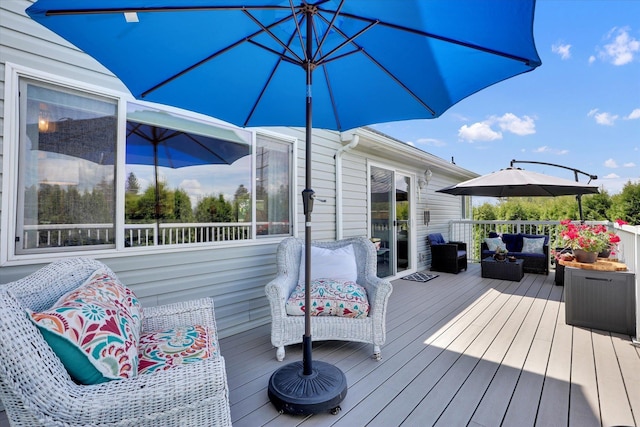 8310 E Bull Pine Ln, Spokane, WA 99217 - wooden deck with an outdoor hangout area