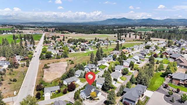 8310 E Bull Pine Ln, Spokane, WA 99217 - aerial perspective of suburban area with mountains