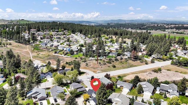 8310 E Bull Pine Ln, Spokane, WA 99217 - aerial overview of property's location with nearby suburban area