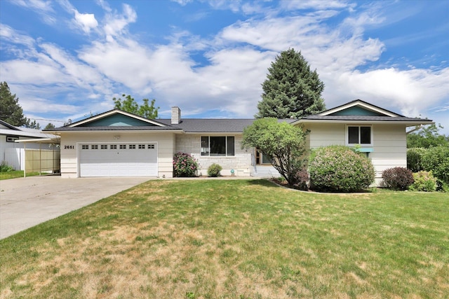 2651 E 35th Ave, Spokane, WA 99223 - ranch-style home featuring a chimney, driveway, and a garage