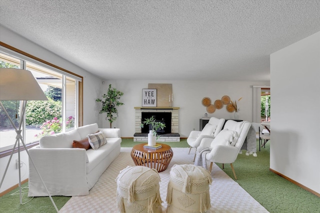 2651 E 35th Ave, Spokane, WA 99223 - living area with carpet floors, a brick fireplace, and a textured ceiling